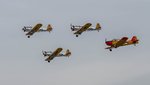 Formation of Ryan ST3KR and a Fokker S-11-1-1028.jpg