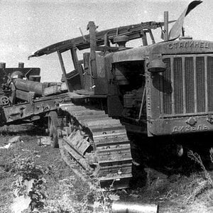 A damaged soviet tractor S-65 Stalinetz with the 152mm ML-20 gun, 1942