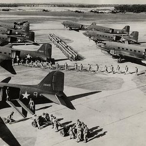 C-47 Dakotas Load Troops