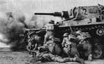 tommys_take_cover_behind_a_pz.kpfw_iii_in_tobruk_102.jpg