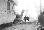 36th_infantry_scouts_of_3ad_enter_mont-le_ban__belgium_under_fire_jan_26_1945_896.jpg