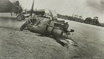 Sangi Sangi Philippines 1945 The engine which has been torn off a Kittyhawk aircraft as a resul.jpeg