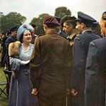 Buck Pallace 1945 Queen with Repat POWs.jpg