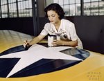 woman-painting-insignia.jpg
