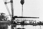 One of the 14-inch gun tubes being removed.jpg
