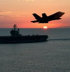 jsf__f_35__over_carrier_at_sunset_resized_144.jpg