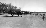 MitchellmediumbombersandtheircrewsandgroundsupportstaffatanairbaseinNorth-WesternAustraliaduring.jpg