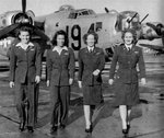 WASP pilot Millie Davidson Dalrymple, Second left with B-24 aircraft, Aug 1943-Jan 1947.jpg