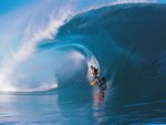 Surfing in Teahupoo, Tahiti.jpg