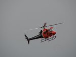Australian_Park_Air_1_Fire_Spotting_Helicopter_In_Flight.jpg