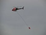 Australian_Park_Air_Helicopter_Carrying_Aerial_Fire_Fighting_Bucket.jpeg