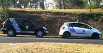Australian_Queensland_Ipswich_Police_Car_Near_Similar_Security_Car.jpeg