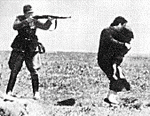 waffen_ss_kills_a_jew_mother_and_then_her_child_695.gif