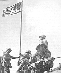 Iwo Jima, first flag raised.gif