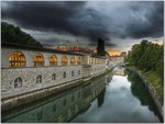 Backside of Market Colonnade and Ljubljanica River at Dusk Ljubljana Slovenia.jpg