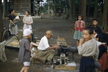 0125_Japanese Man Making Pop Corn -Exploding Rice.jpg