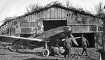 Bf 109F camouflaged hangar.jpg