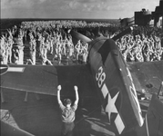 F6F-3 Hellcat 38. Crew during morning exercises at sea USS Yorktown CV-10.png
