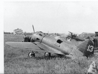 I-16 type 6 Yellow 13' with weapons removed. In the background is a I-152 fighter Spanish Civi...png