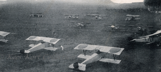 A post war view of a Japanese Army training field with in front a row of licence built Nieupor...png