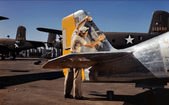 B-25 Mitchells '113178' and '113180' with a P-51 Mustang in front 1942.png