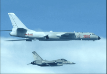 Xian H-6N '20013' escorted by a Rupublic of China AF AIDC F-CK-1 fighter 2017 ROCMND .png