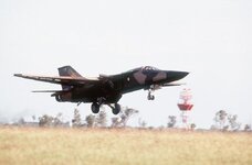 right-side-view-of-an-australian-f-111-fighter-aircraft-taking-off-during-pitch-black-84-a-joi...jpg