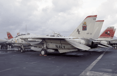 Wearing hi-viz markings of VF-11 %22Red Rippers%22 over CV-59 USS Forrestal fligh deck 1989 AIRH.png