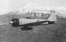 A newly delivered A6M2 Zero in flight with Mount Fuji in the background, photographed by Lt Fu...png