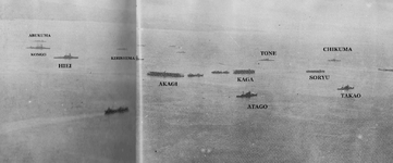 A view of the Japanese fleet anchored in Staring Bay taken from the floatplane of the heavy cr...png