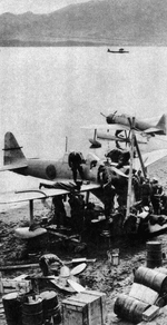 A6M2-N under maintenance. The tail marking is censored but the letter %22R%22 is visible. Note...png