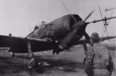Nakajima Ki-84 Hayate being started by a starter truck REDD.png