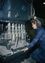 a-woman-war-worker-machining-a-cylinder-block-for-a-rolls-royce-aero-engine-b3f900.jpg