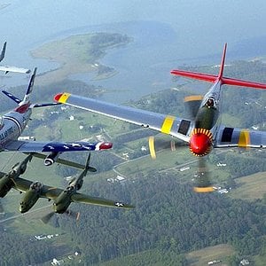 P-51, P-38, F-86 and A-10 in Formation
