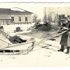 German Soldiers Playing With a Sledge