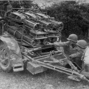 A German Nh.Werfer 42 is examined by GI´s.