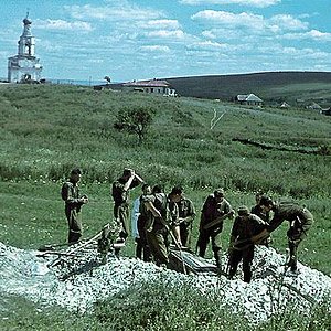 Hungarians burying a comrade.