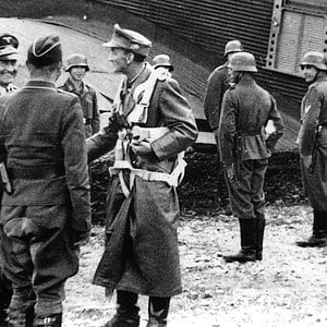 Gen Eduard Dietl (with 'chute) of Wehrmacht Gebitgsjager loads for Crete 19