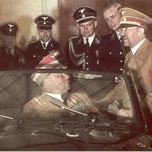 Adolf Hitler and officers are introduced to the VW Beetle Cabriolet, 1939.