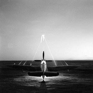 RAAF_Supermarine_Spitfire_451Sqn_cannons_blazing_ranged_-_300yds_El_Daba_Eg