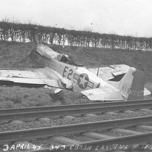 P-51 in a heap by a railway line, 361st FG