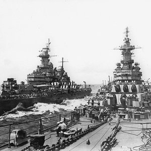 Two_battleships_pull_up_to_say_hello_