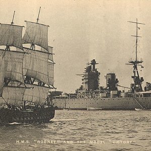 HMS Rodney and a replica of HMS Victory