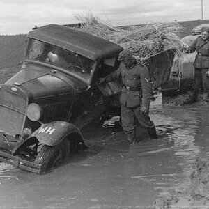 A captured and used by Germans soviet GAZ AA truck.