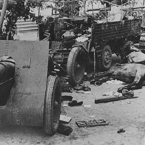 An abandoned S-65 Stalinetz tug with 152mm howitzer model 1909/30, 1941