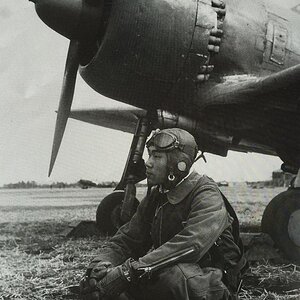 Sergeant Abe Seigunso next to a Ki-43-IIIa