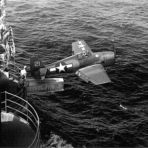 Grumman F6F-3 Hellcat 'White 21", VF-15, the hangar deck catapult, USS Hornet (CV-12), 1944 (1)