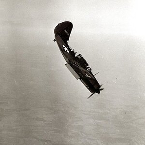 A diving Curtiss-Wright A-25 Helldiver , 1944