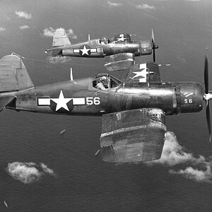 F4U-1 Corsairs of VMF-113 in flight near Eniwetok, 1944