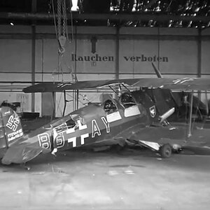 A damaged Bücker Bü 131 at the Celle-Wietzenbruch airfield, Germany 1945
